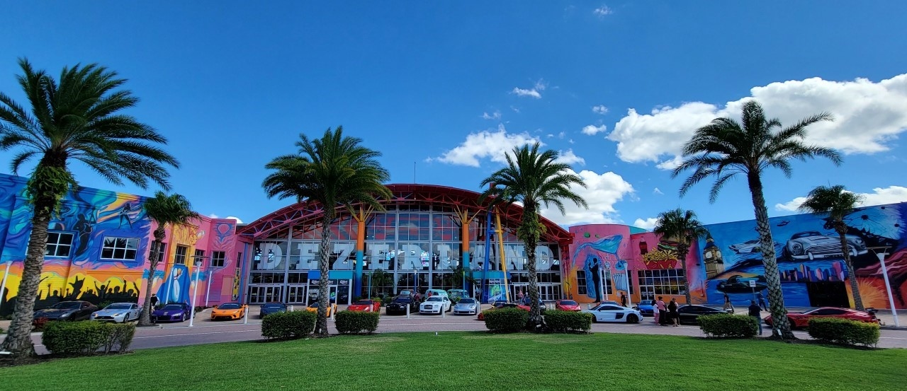 The famous upside-down building facade of the WonderWorks attraction in Orlando, designed to look like a classic brick building ripped from its foundation.